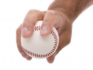  The four seamer grip. 